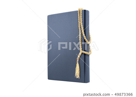 Quran and prayer beads Quran and prayer beads 49873366