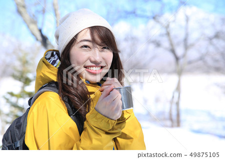 Woman enjoying winter leisure 49875105