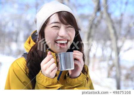 Woman enjoying winter leisure 49875108