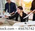Asian businesswoman is sign her document. 49876742