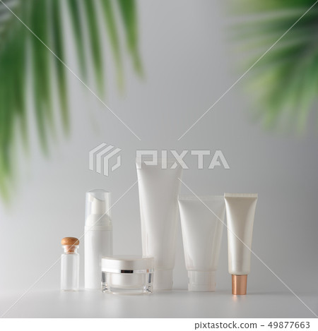 Set of cosmetic products on a color background. Set of cosmetic products on a color background. 49877663