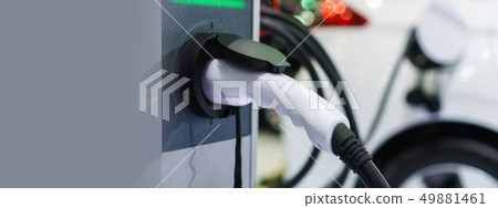 Electric car charging on charge station, Transport 49881461