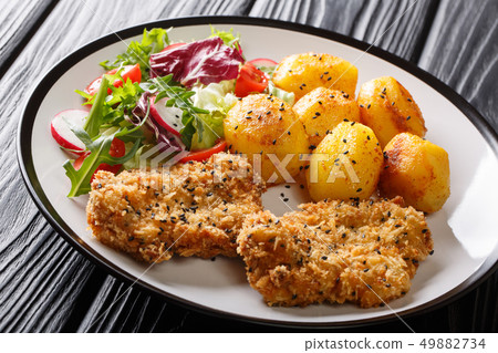 Main course fried steaks in sesame breaded with Main course fried steaks in sesame breaded with 49882734
