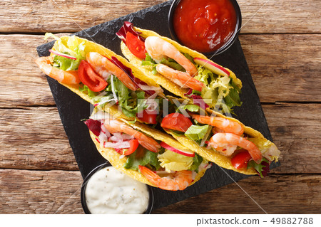 Fresh corn tacos with shrimps, fresh vegetables Fresh corn tacos with shrimps, fresh vegetables 49882788