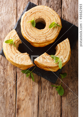 Baumkuchen, translated as tree cake, is a 49882993