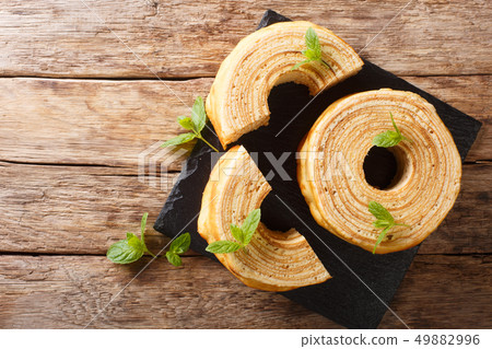 Baumkuchen, translated as tree cake, is a 49882996