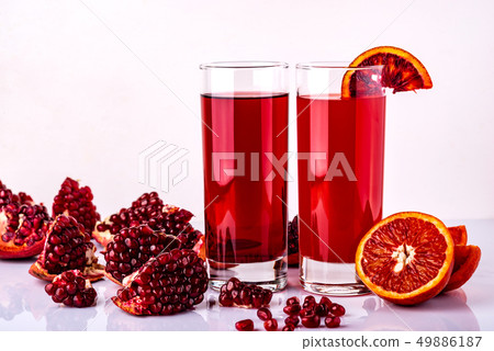 Set of healthy fresh red color drinks on the white background. Raw drinks and foods. Set of healthy fresh red color drinks on the white background. Raw drinks and foods. 49886187