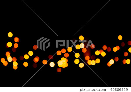 Unfocused abstract gold bokeh on black background. Unfocused abstract gold bokeh on black background. 49886329