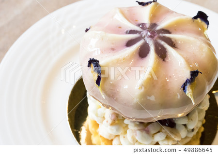 Legal and moral. Top surface rice, fruit freeze, soy sauce, white power, dried flowers. 49886645