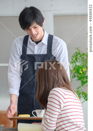 Male cafe clerk and female customer Male cafe clerk and female customer 49886932