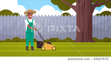 man gardener cutting green grass with lawn mover african american farmer moving garden backyard man gardener cutting green grass with lawn mover african american farmer moving garden backyard 49887679