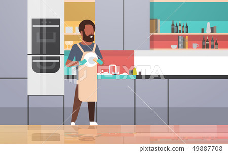 young man washing dishes african american guy wiping plates doing housework dishwashing concept young man washing dishes african american guy wiping plates doing housework dishwashing concept 49887708