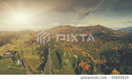 Majestic mountainous scenery multicolored wood Majestic mountainous scenery multicolored wood 49889926