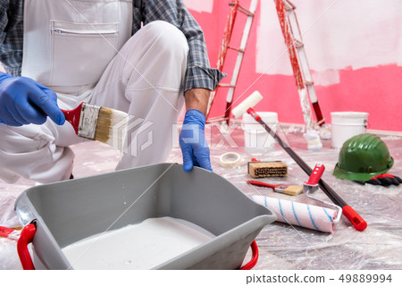 House painter worker at work in the construction 49889994