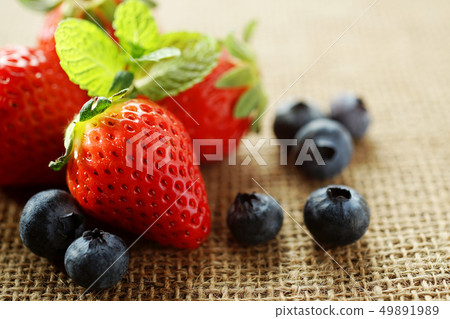 Strawberries and blueberries Strawberries and blueberries 49891989