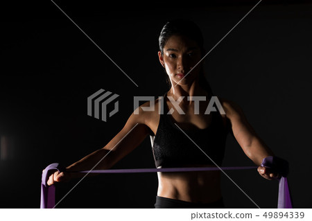 Fitness woman exercise stretch arms legs Fitness woman exercise stretch arms legs 49894339