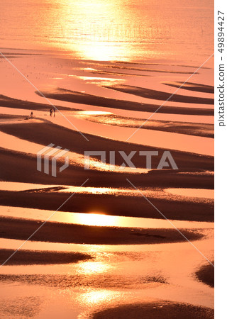 Sunset over the coast of Okinawa 49894427