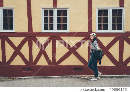 town in denmark with student walking along wall 49896133