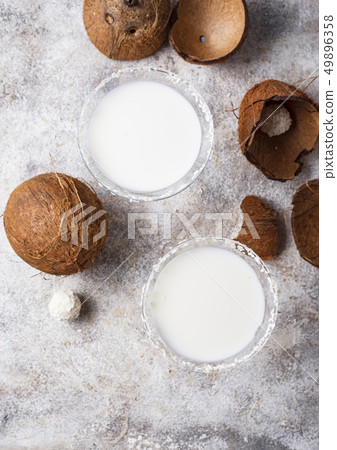 Coconut martini or Margarita. Alcoholic cocktail Coconut martini or Margarita. Alcoholic cocktail 49896358