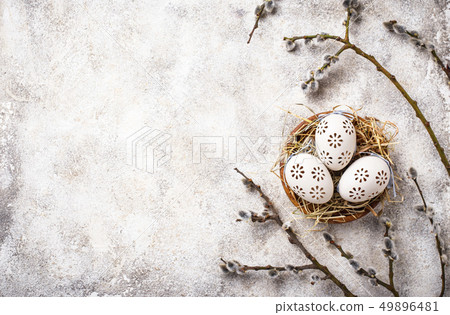 Easter background with willow and eggs 49896481