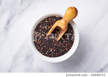 Healthy black quinoa seeds in bowl Healthy black quinoa seeds in bowl 49896552