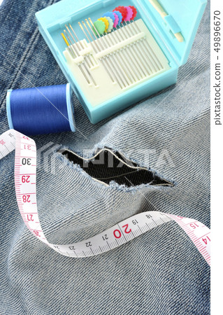 Fix the torn place and wear again Fix the torn place and wear again 49896670