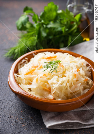 Homemade sauerkraut or pickled cabbage Homemade sauerkraut or pickled cabbage 49896747