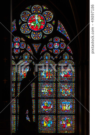 Stained glass window in Notre dame de Paris 49897186