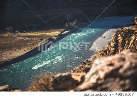 Amazing landscape with mountains, beautiful curving river, autumn forest in Altai. Mountain valley. 49899107
