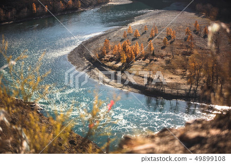 Amazing landscape with mountains, beautiful curving river, autumn forest in Altai. Mountain valley. 49899108