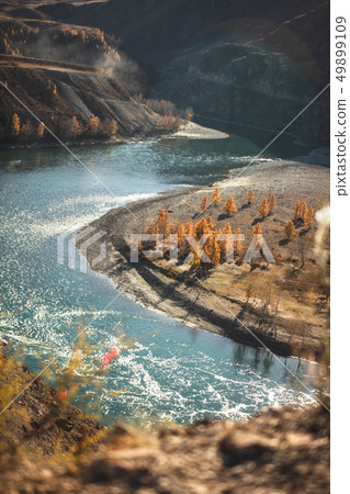 Amazing landscape with mountains, beautiful curving river, autumn forest in Altai. Mountain valley. 49899109