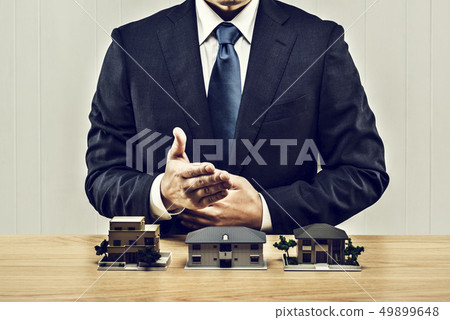 Architectural model and businessman Architectural model and businessman 49899648