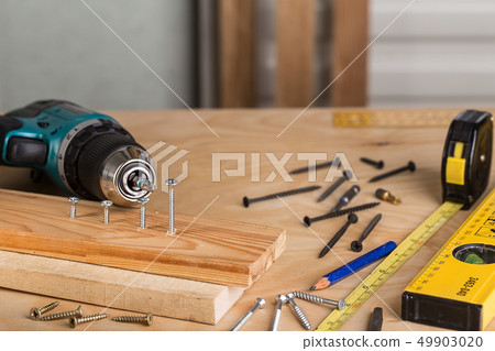 Working Tool on a Wooden Table. Set of tools.  49903020