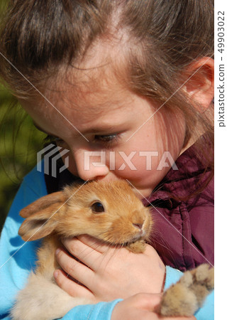 little girl and her bunny 49903022
