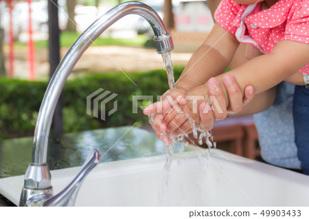 Cute baby little hands Cute baby little hands 49903433