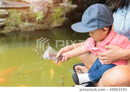 Asian beautiful mother is take care your cute baby Asian beautiful mother is take care your cute baby 49903593
