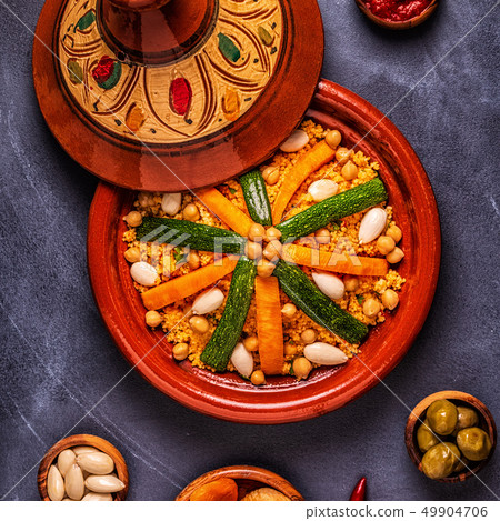 Vegetable tagine with almond and chickpea couscous 49904706