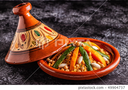 Vegetable tagine with almond and chickpea Vegetable tagine with almond and chickpea 49904737