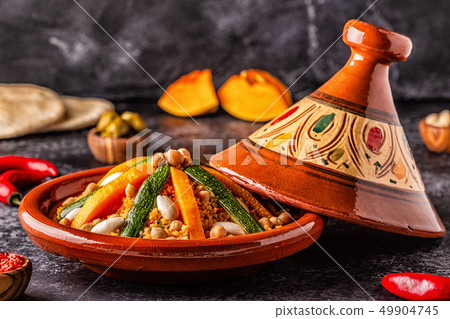 Vegetable tagine with almond and chickpea Vegetable tagine with almond and chickpea 49904745