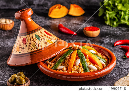 Vegetable tagine with almond and chickpea Vegetable tagine with almond and chickpea 49904748