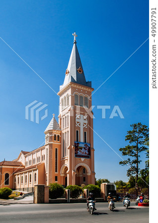 Da Lat Cathedral Motorcycle running pass in front Da Lat Cathedral Motorcycle running pass in front 49907791