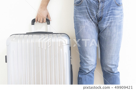 A man with a suitcase 49909421