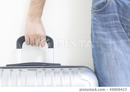 A man with a suitcase 49909423