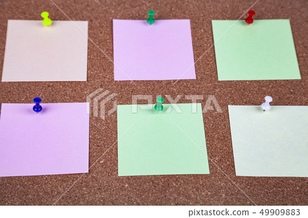 Corkboard with notes. Corkboard with notes. 49909883