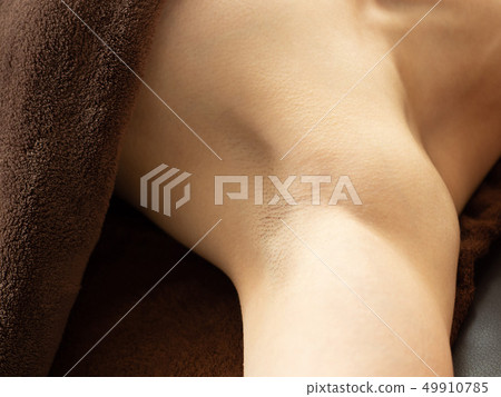 The side of a woman who is clearly marked by shaving before hair removal 49910785