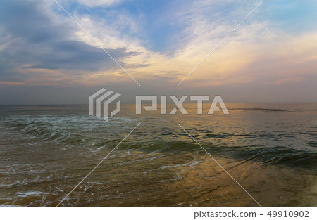 Panorama of beautiful sunset on the ocean. 49910902