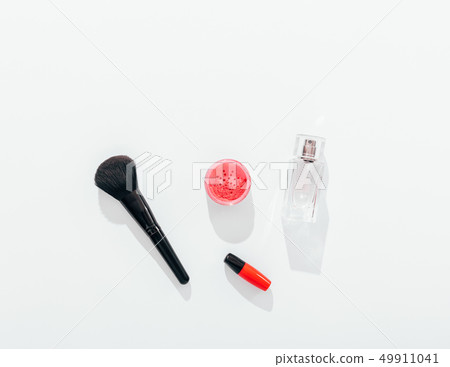 Flat lay composition of feminine cosmetic products Flat lay composition of feminine cosmetic products 49911041