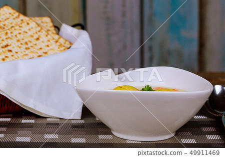 Matzah balls in a pot of soup during the Jewish Matzah balls in a pot of soup during the Jewish 49911469