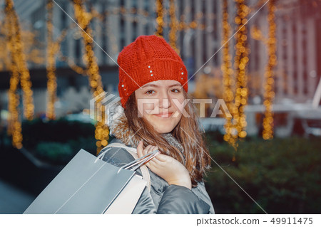 beautiful red head young teenager in the city 49911475