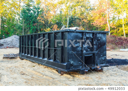 Dumpsters being full with garbage Dumpsters being full with garbage 49912033